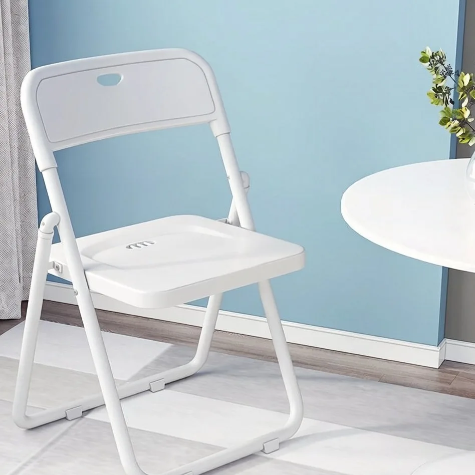 White plastic folding chair
